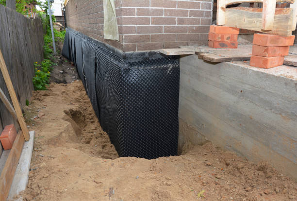 Happy homeowners after waterproofing job in Ringle